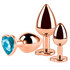 Set di plug anali in metallo con base a forma di cuore.